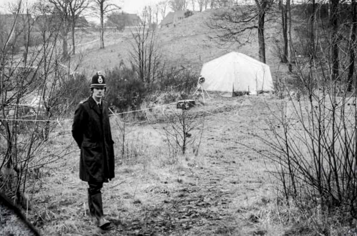 The tent and policeman standing guard in 1975