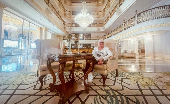 Opulent lobby of the Titanic Mardan Palace in Antalya with grand chandeliers and luxury seating