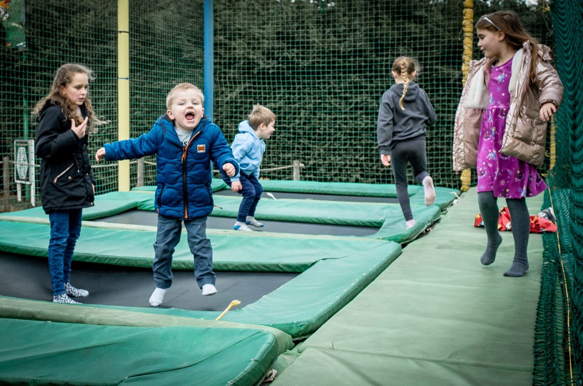 Small boy bouncing on a trampoline at Wheelgate Park in Nottinghamshire.