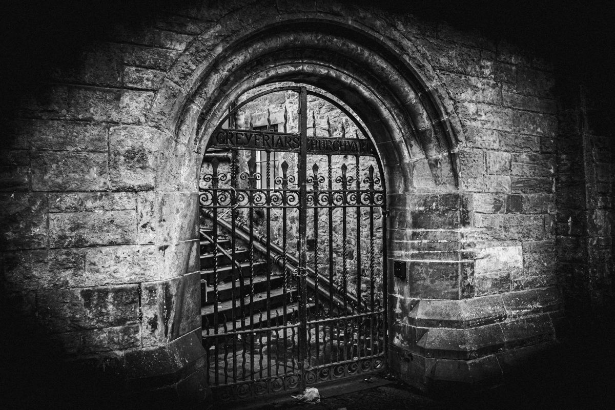 Ornate iron gate entrance to Greyfriars Kirkyard, Edinburgh.