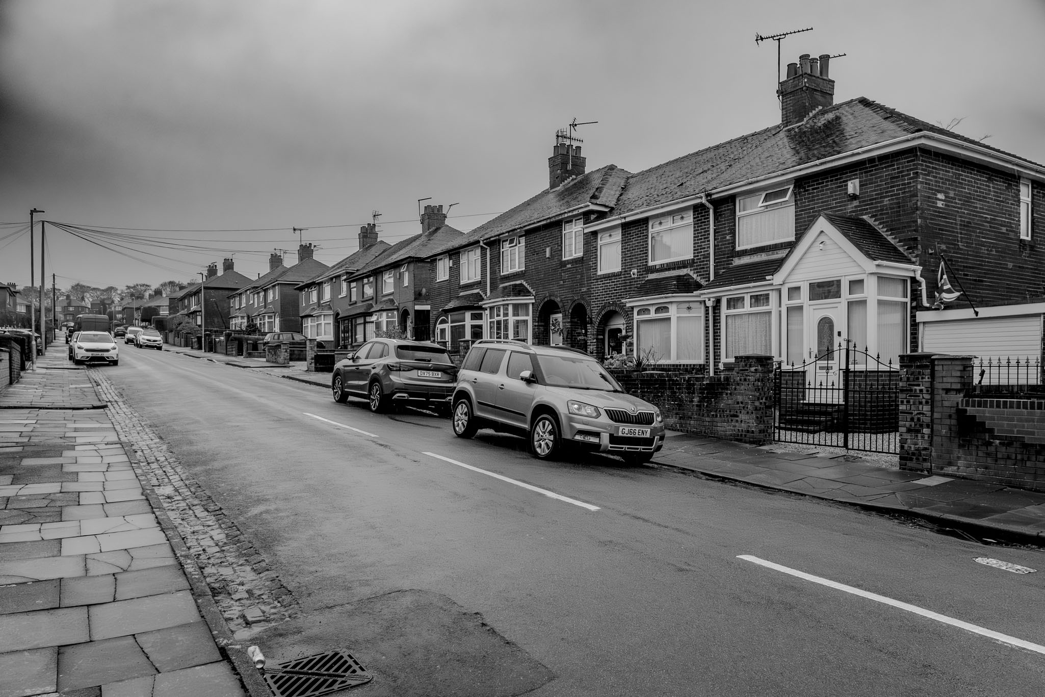 A monochrome photo of the residential street in Burslem where Ian 'Lemmy' Kilmister was born.