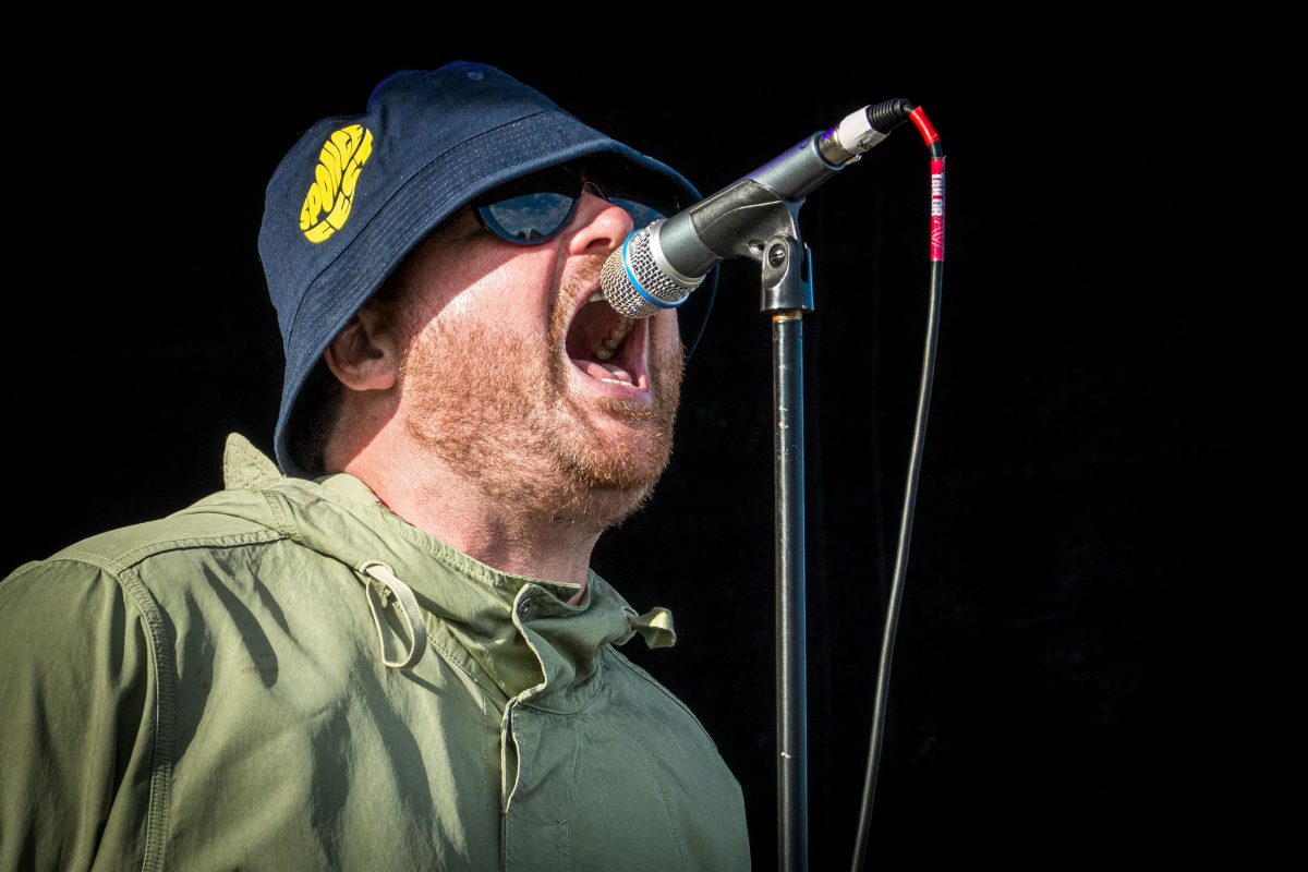 Close-up of the Oasis tribute band singer