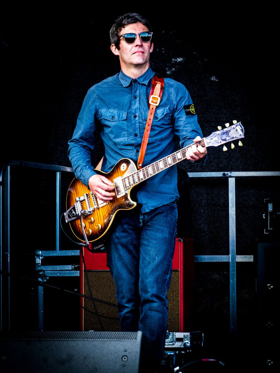 Guitarist from Oasis tribute band performing at Spongefest