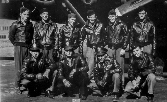 This image shows the crew of the B-17 Flying Fortress known as the "Mi Amigo" during their training in Seattle, Washington